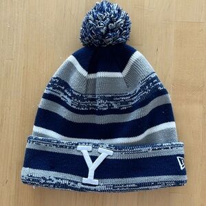 Yale University New Era blue and gray striped beanie. One size fits most.